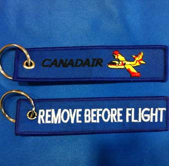 Llavero Remove Before Flight Canadair azul